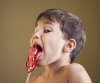 pngtree-boy-eating-a-lollipop-yummy-enjoy-lick-photo-image_9482216.jpg